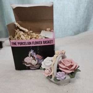 Fine Porcelain Flower Basket with Pink and White Flowers.